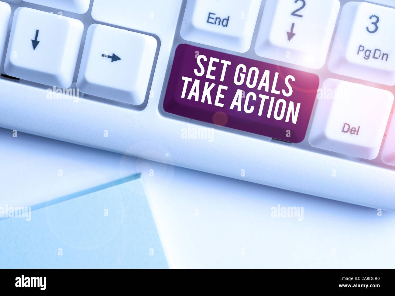 Text sign showing Set Goals Take Action. Business photo text Act on a specific and clearly laid out plans White pc keyboard with empty note paper abov Stock Photo