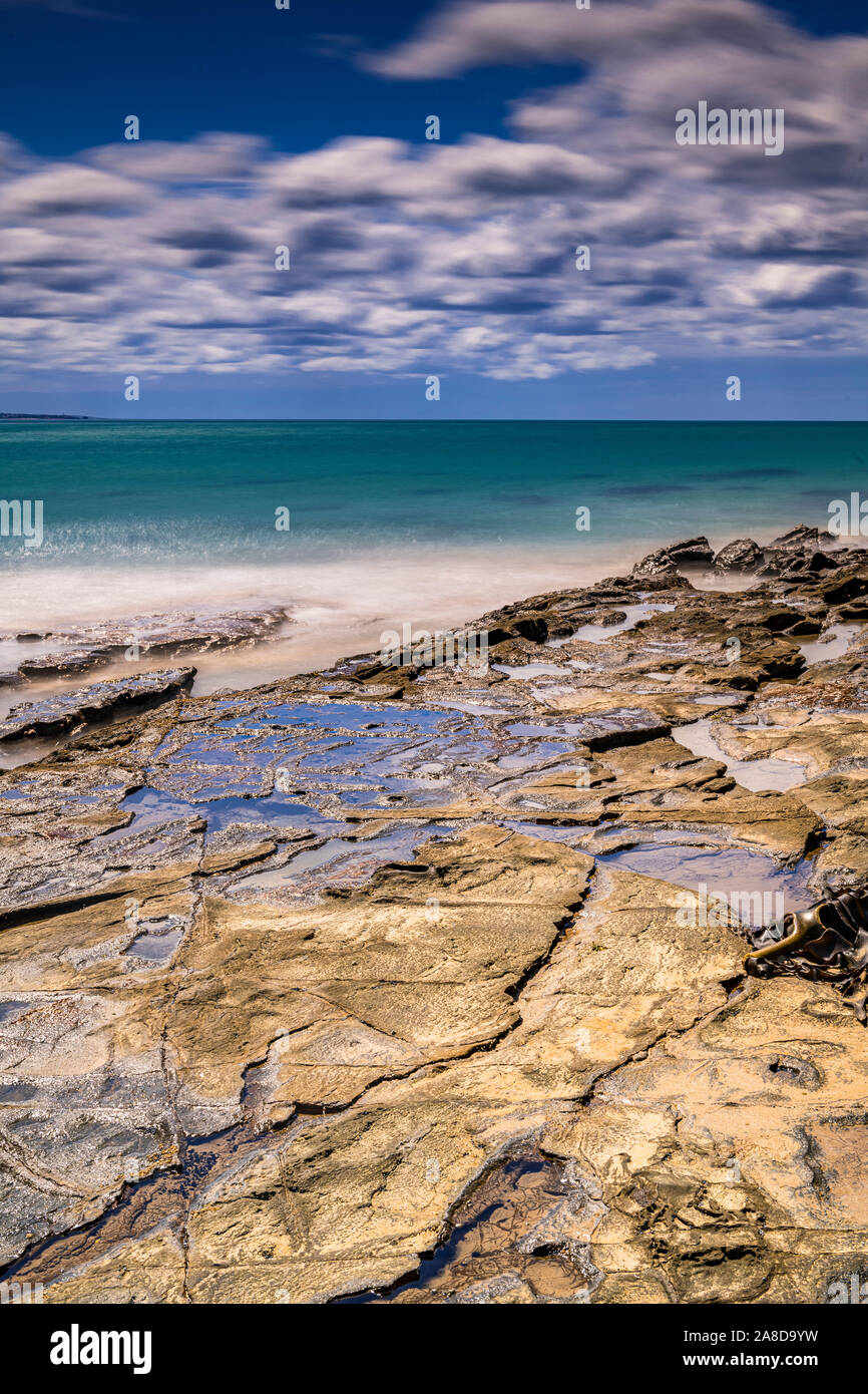 The rocky shoreline surrounding the seaside town of Lorne, Victoria, Australia. Stock Photo