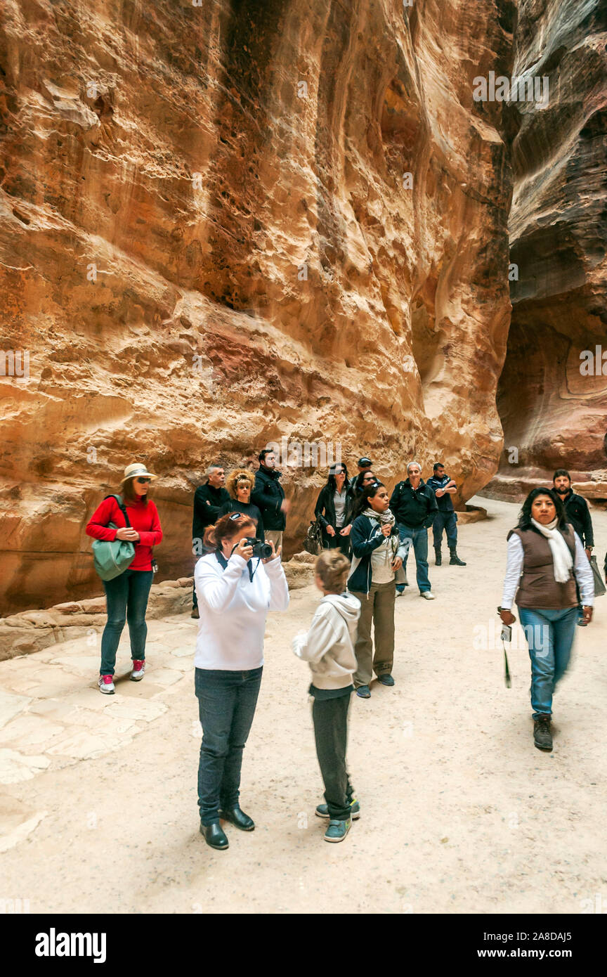 PETRA, JORDAN-FEBRUARY 2015. Tourists in Petra in Jordan .. Petra is an  important archaeological site in Jordan, and the capital of the ancient  Nabate Stock Photo - Alamy