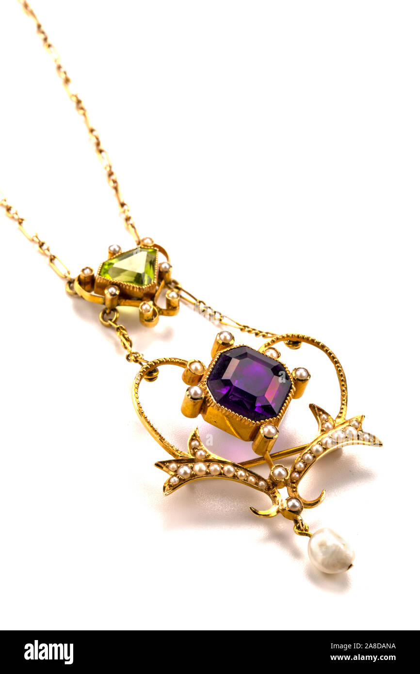 Suffragette gold necklace of peridot, seed pearl, pearl and amethyst. So called due to 'brand image' colours of the woman movement. Edwardian. Stock Photo