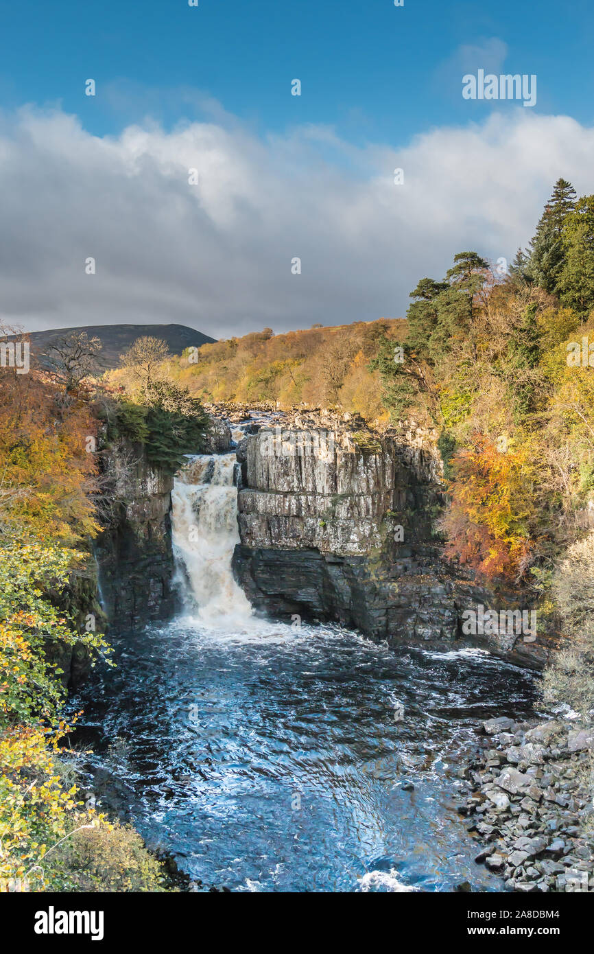 Vivid autumn colours at High Force Waterfall, Upper Teesdale, UK Stock Photo