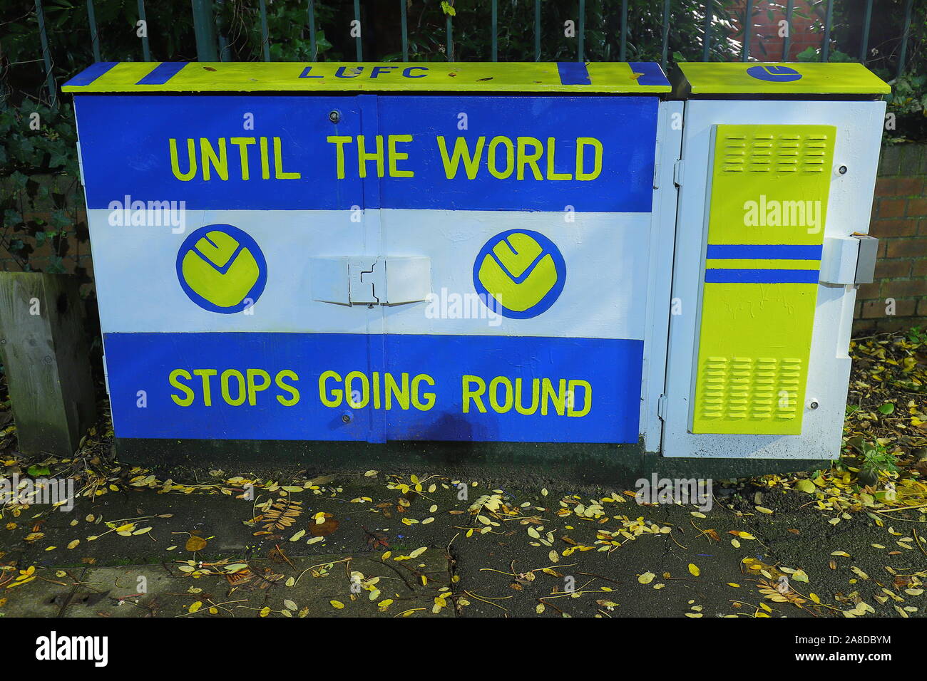 A telecommunications box in Leeds has been painted by an artist to mark 100 years of Leeds United Football Club Stock Photo