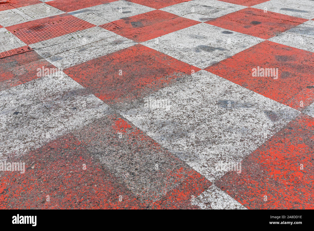 Red and White Checkered Pattern Race Track Speedway Stock Photo