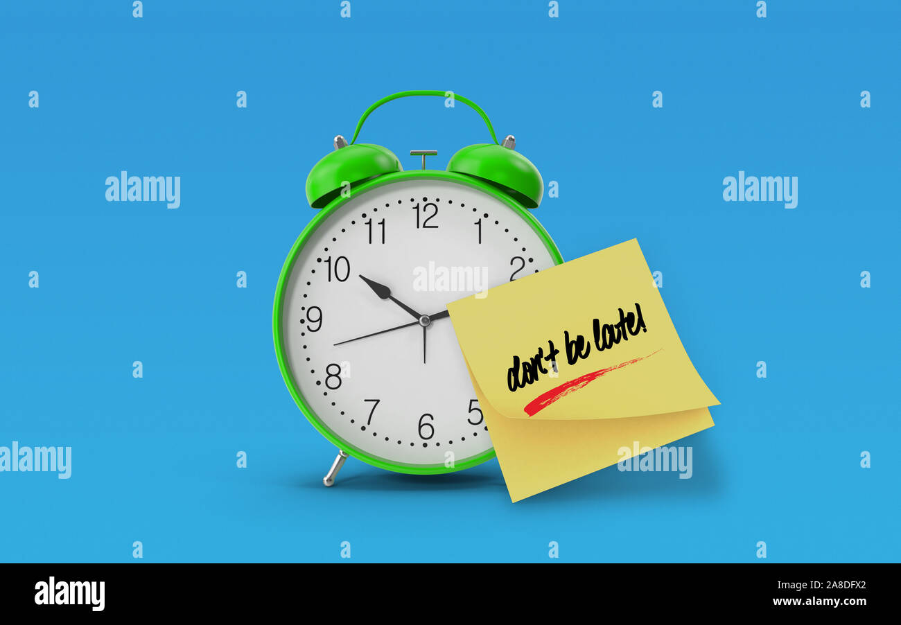 Don't Be Late message written on yellow sticky note paper attached to a ...
