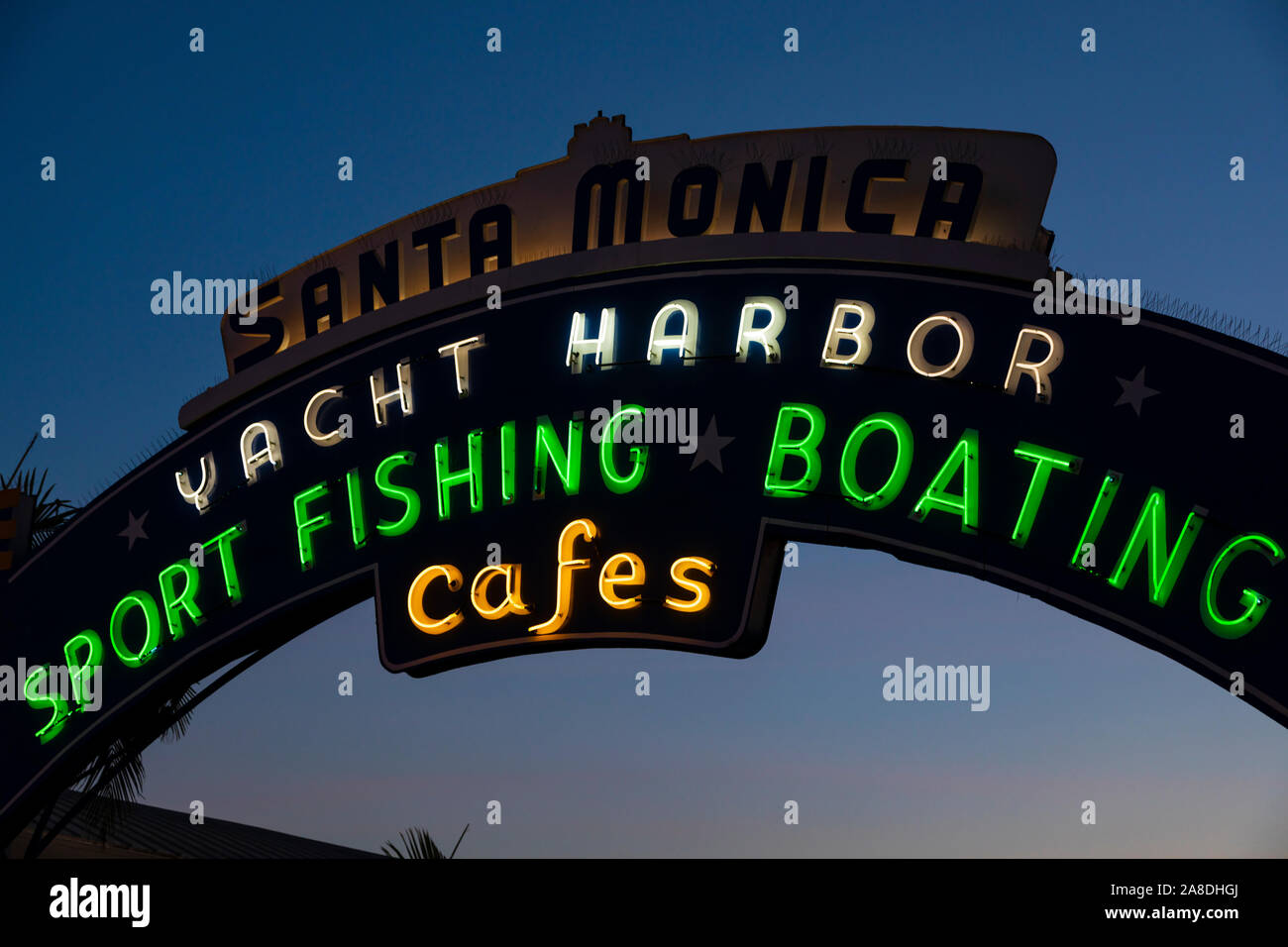 entrance sign to Santa Monica pier. Yacht harbor, sport fishing,boating and cafes.  Los Angeles County, California, United States of America Stock Photo