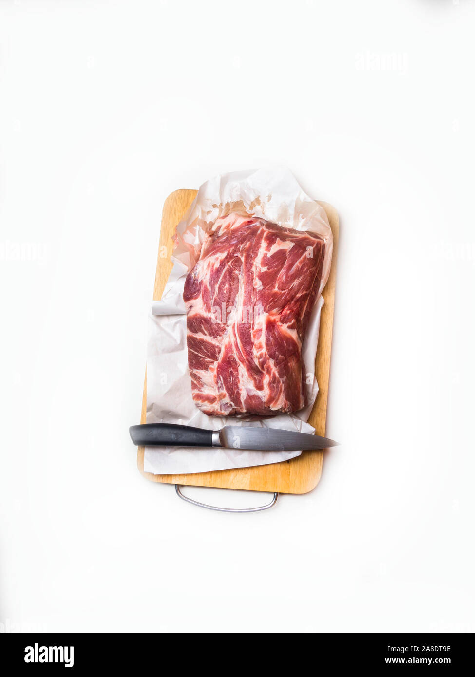 Raw pork meat isolated on white background with knife Stock Photo - Alamy