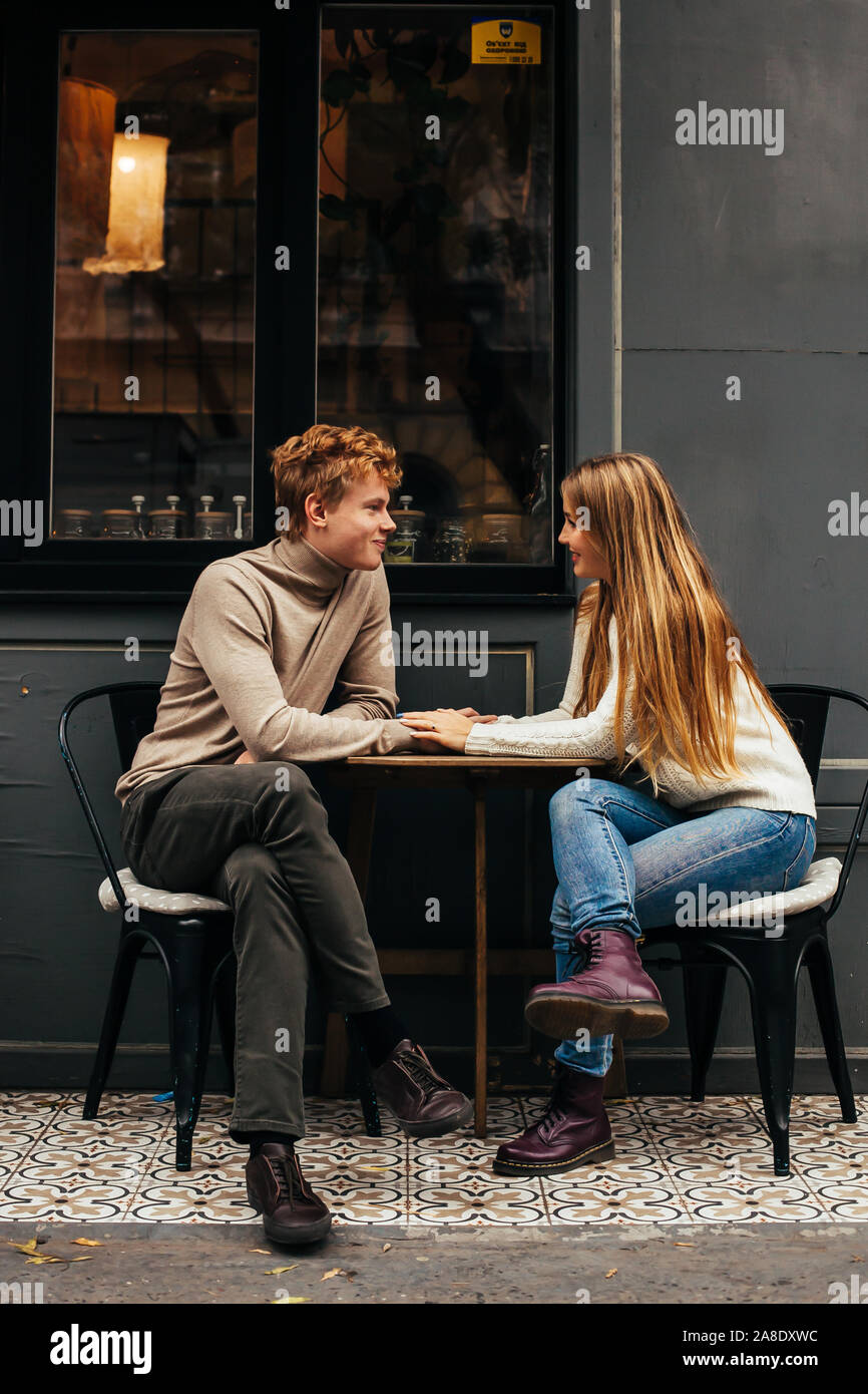 Portrait of a young couple in love in a cafe Stock Photo