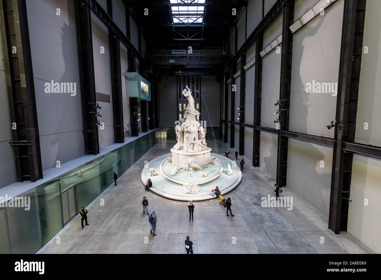 LONDON - NOV 6, 2019: Interior of Tate Modern in London with water fountain sculpture by Kara Walker Stock Photo