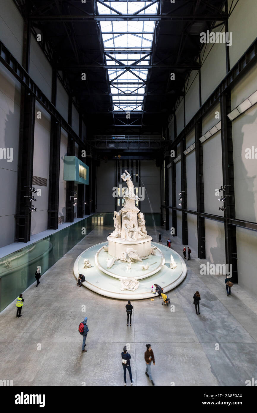 LONDON - NOV 6, 2019: Interior of Tate Modern in London with water fountain sculpture by Kara Walker Stock Photo
