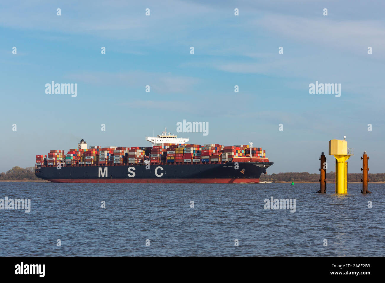 Stade, Germany - November 8, 2019: Container ship MSC NEW YORK on Elbe river heading to Hamburg. Stock Photo