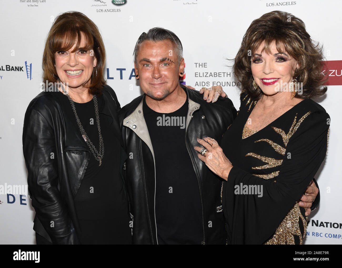 07 November 2019 - Beverly Hills, California - Linda Gray, Mark Zunino, Joan Collins. Mark Zunino Atelier Fashion and Cocktail Reception to Benefit The Elizabeth Taylor AIDS Foundation held at Mark Zunino Atelier. Photo Credit: Billy Bennight/AdMedia/MediaPunch Stock Photo