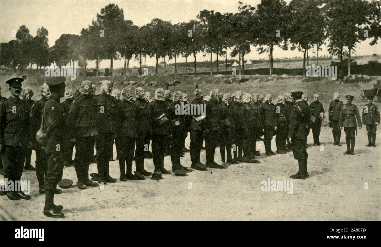 'Preparing for Battle on the Somme', northern France, First World War, c1916, (c1920). '...respirator drill for the Guards behind the lines'. British troops practice with gas masks before going to the trenches. From &quot;The Great World War: A History&quot;, Volume VI, edited by Frank A Mumby. [The Gresham Publishing Company Ltd, London, c1920] Stock Photo