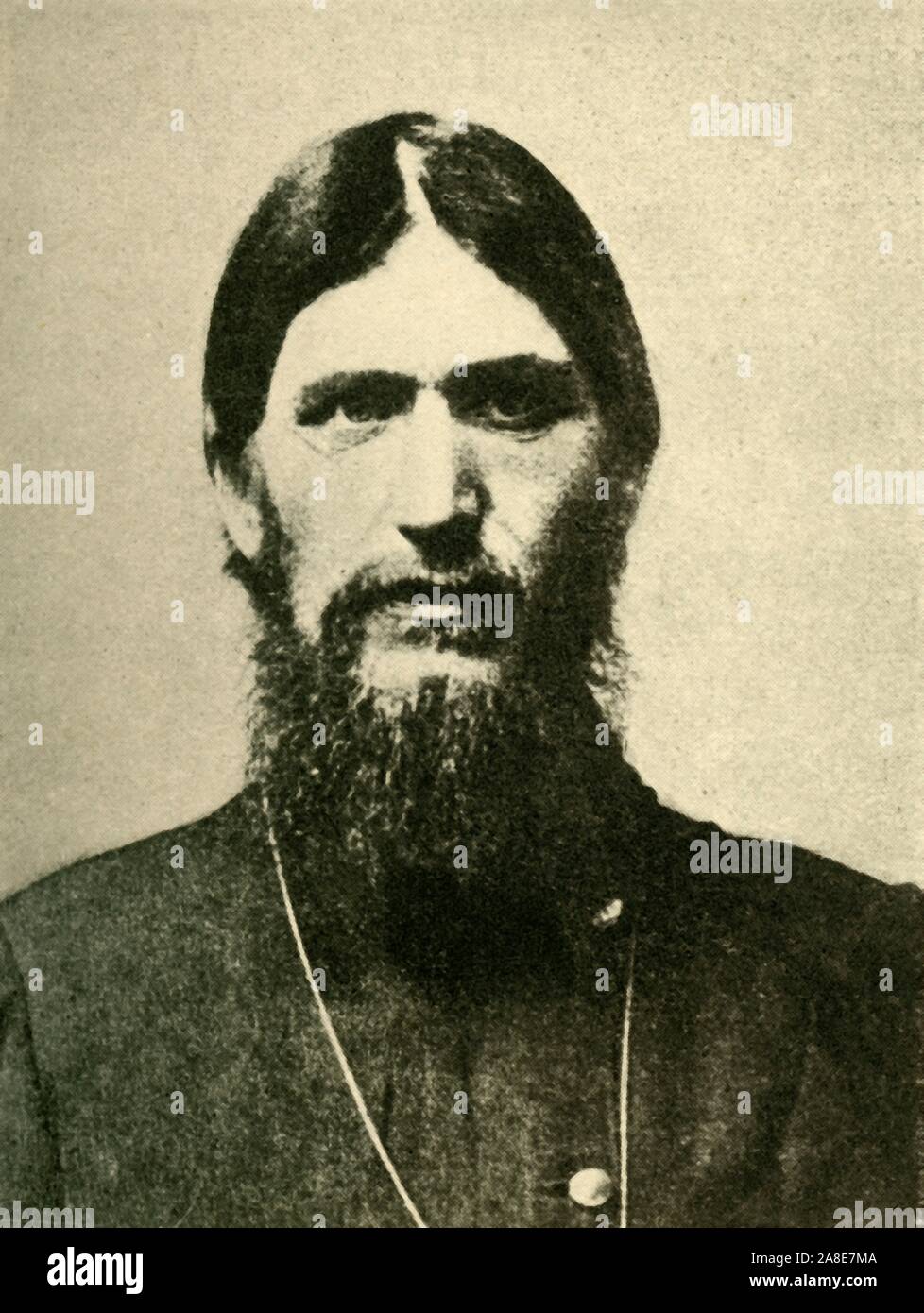 Grigori Rasputin, 1910, (c1920). 'Gregory Rasputin, the Evil Genius of the Russian Court'. Portrait of Russian monk Rasputin (1869-1916) who exercised considerable influence over Tsar Nicholas II and particularly the Tsarina Alexandra, partly due to their belief in his ability to heal their son's haemophilia. This influence was widely unpopular, and he was murdered by Prince Felix Yusupov and Grand Duke Dmitri Romanov in 1916. It took several attempts before he finally died. From &quot;The Great World War: A History&quot;, Volume VII, edited by Frank A Mumby. [The Gresham Publishing Company Lt Stock Photo