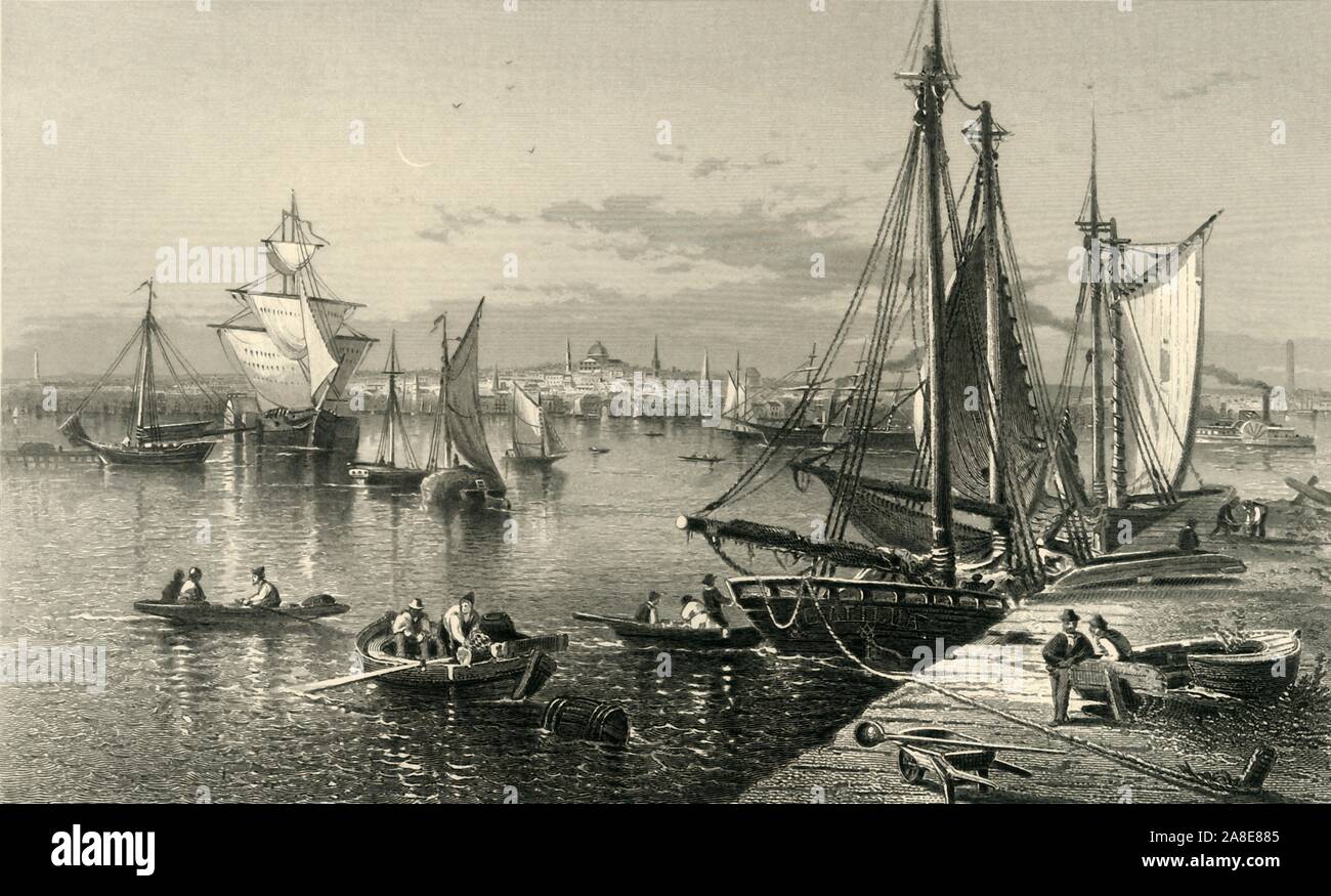 'City of Boston, (from South Boston)', 1874. Ships on the Charles River at the port of Boston, Massachusetts, USA. '...on either hand, are the wharfs and docks, crowded with craft of every size, shape, and nationality, from the little fishing-yachts which are wafting, on a summer's morning, in large numbers hither and thither on the water, to the stately Cunarder, whose red funnel rises amid the masts in its East- Boston slip. An eye-glance from the harbor takes in nearly the whole of the Boston shipping'. From &quot;Picturesque America; or, The Land We Live In, A Delineation by Pen and Pencil Stock Photo