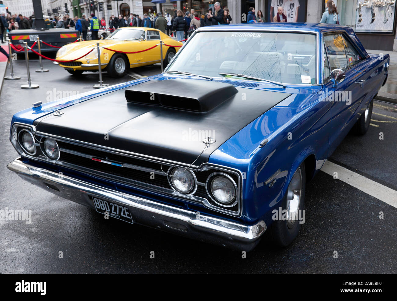 Three-quarter front view of a Blue, 1967, Plymouth GTX, on display at the Regents Street Motor Show 2019 Stock Photo