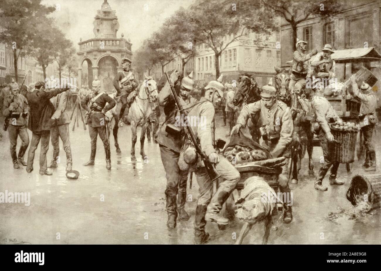 'German Troops Occupying the City of Liege While the Forts Still Thundered Defiance of the Invaders' Advance', 1915. The attack on Liege, a town protected by a ring fortress, began on 5 August 1914 and lasted until 16 August, when the last fort surrendered. From &quot;The War Illustrated Album De Luxe - Volume I. The First Phase&quot;, edited by J. A. Hammerton. [The Amalgamated Press, Limited, London, 1915] Stock Photo