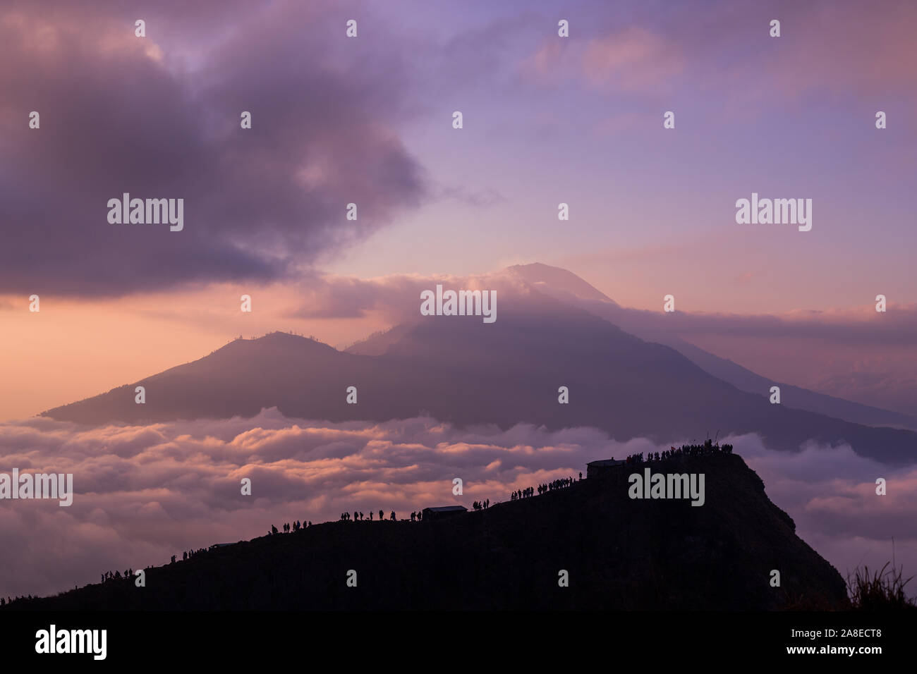 Scenic view of clouds and mist at sunrise from the top of mount Batur ...