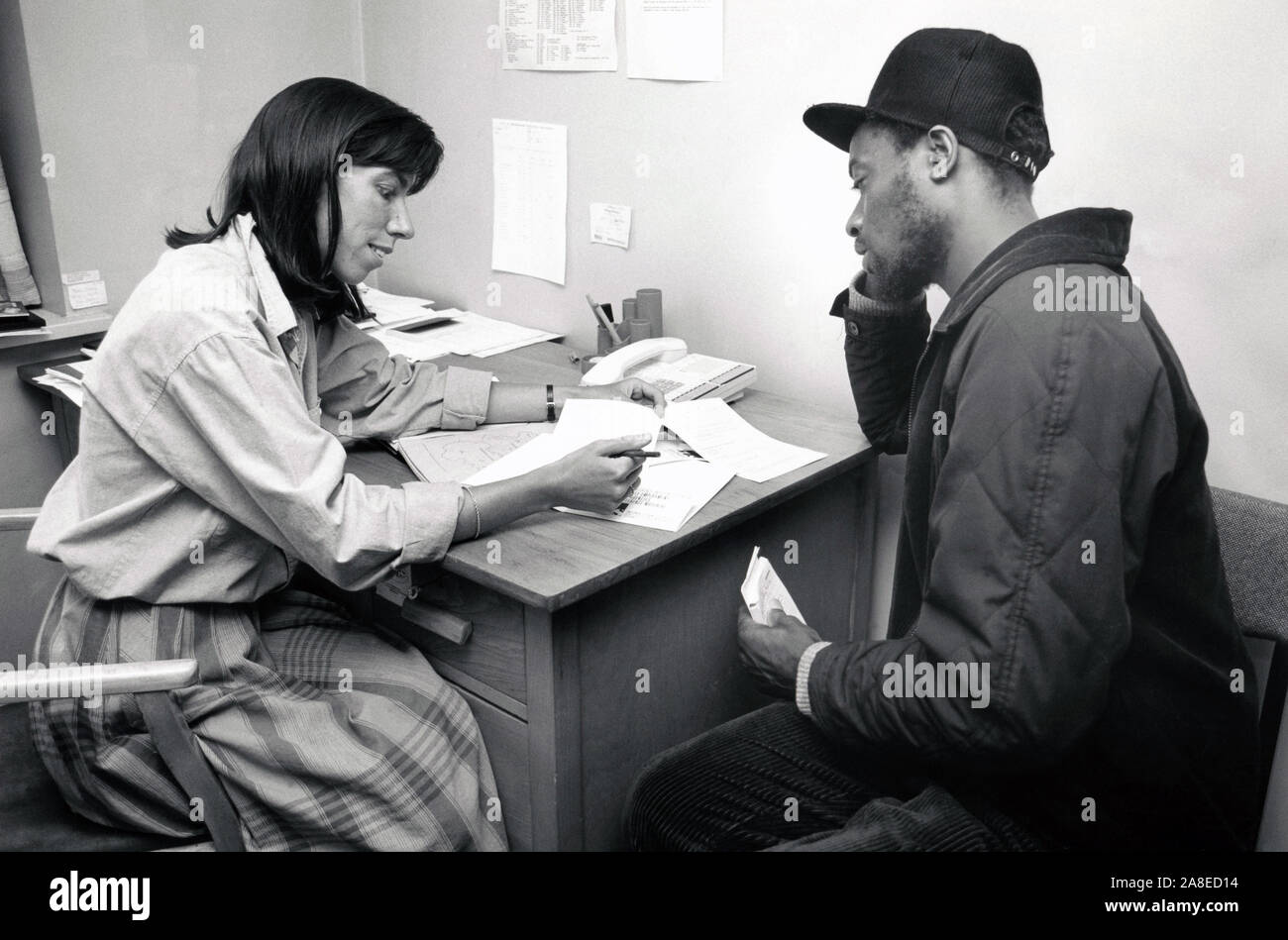 Man visiting the doctor, Nottingham UK 1987 Stock Photo