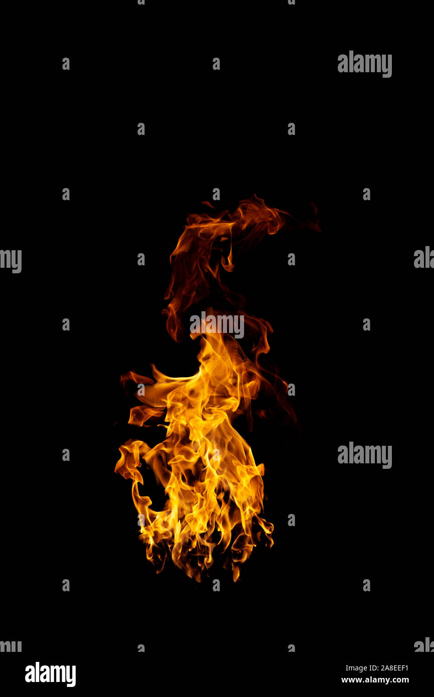 real and hot flames are burning on a black background Stock Photo - Alamy