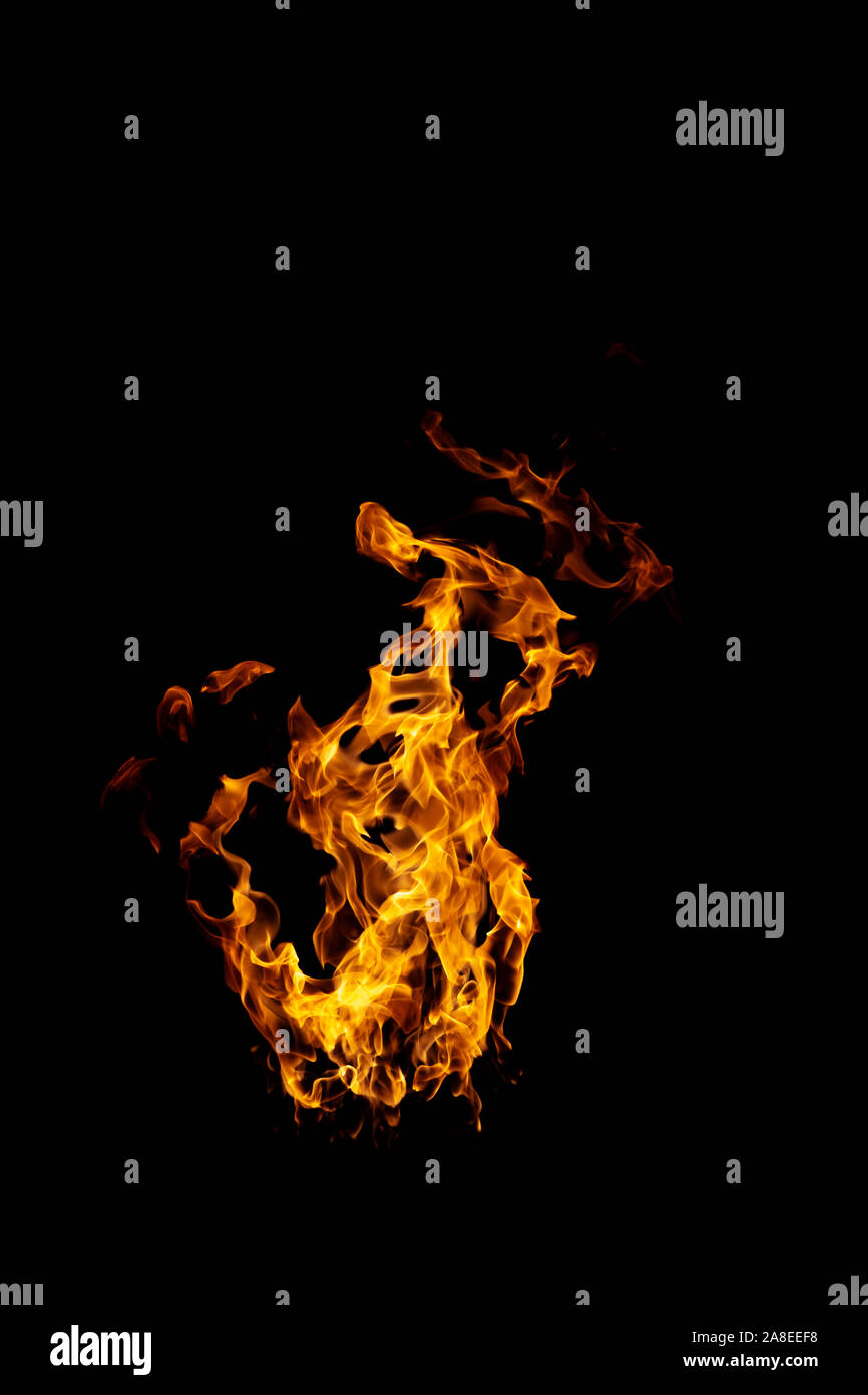 real and hot flames are burning on a black background Stock Photo - Alamy