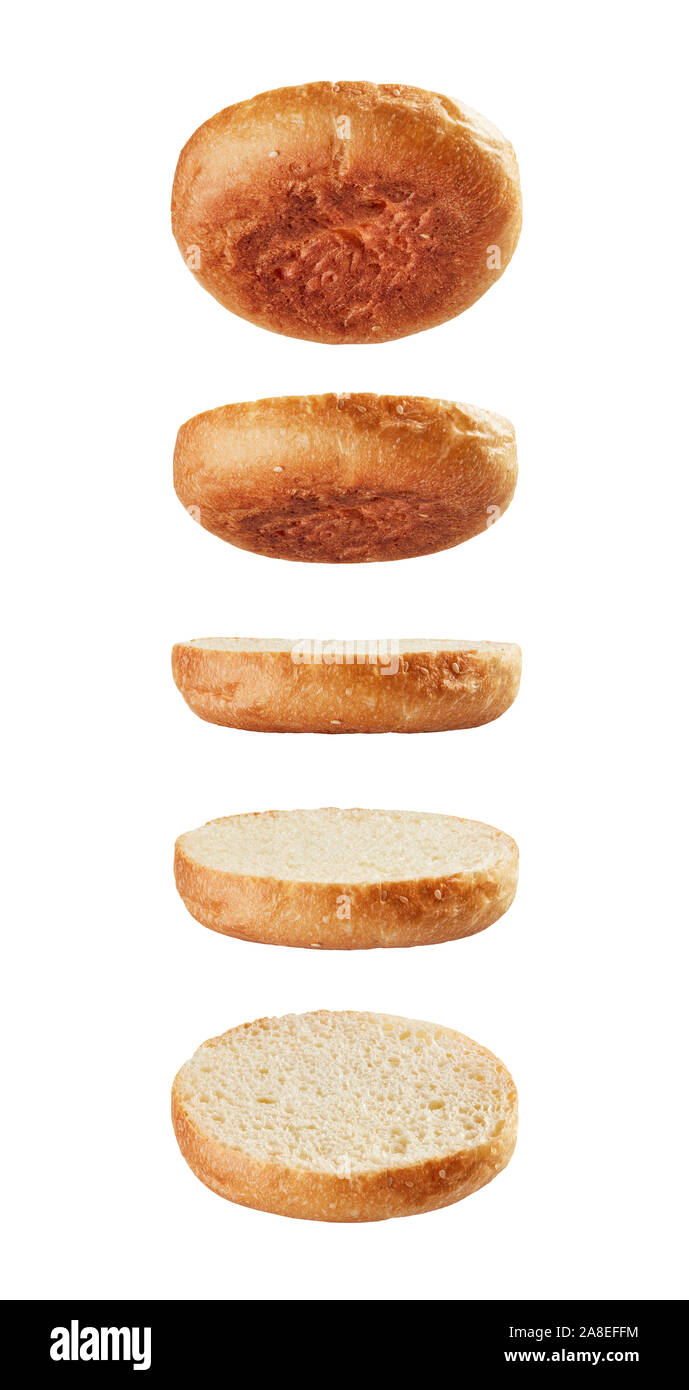 Burger bread bottoms levitating in different angles on white background