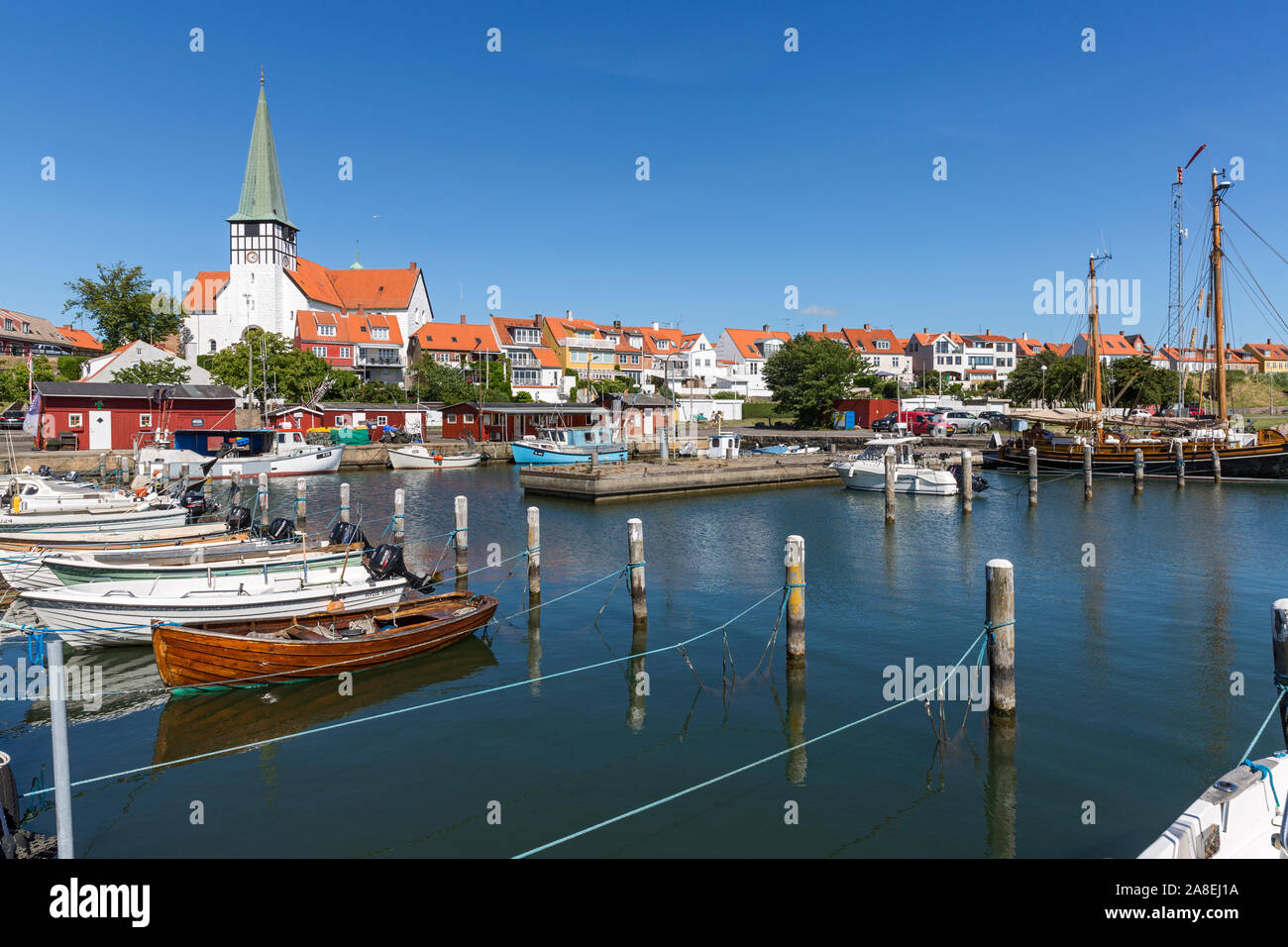 Rønne; Bornholm, Hafen, Boote, Segelschiff, Wohnhaeuser, Nikolai Kirche Stock Photo
