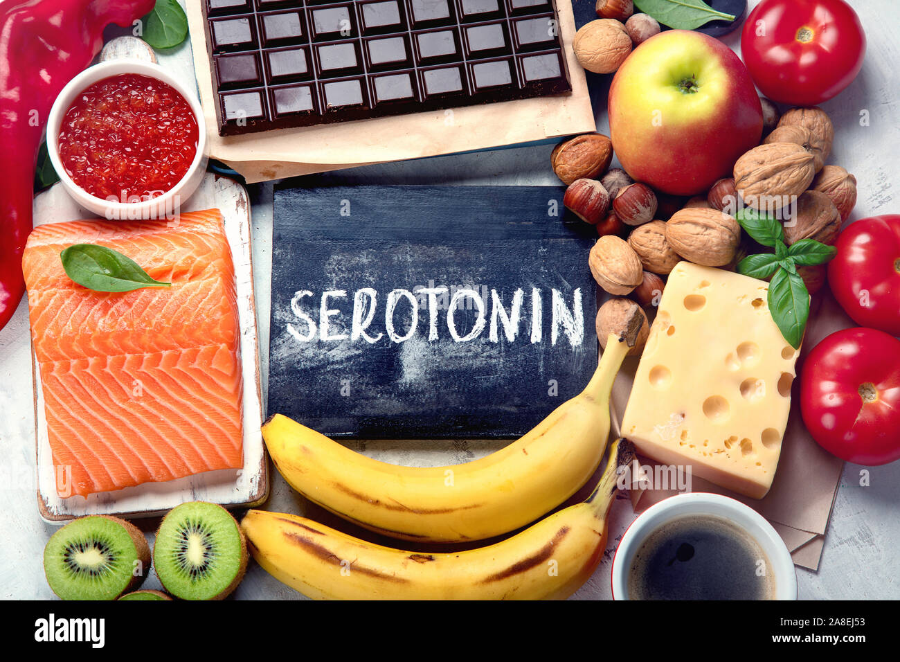 Foods for good mood, brain and happiness. Natural sources of serotonin and dopamine. Food for wellbeing, positive mood, better sleep, appetite and dig Stock Photo