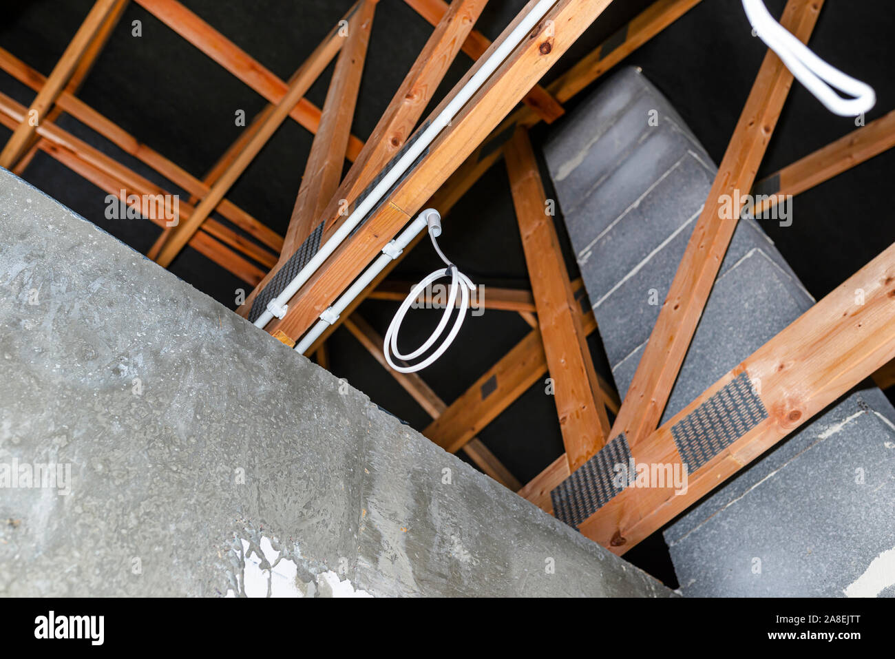 Lighting cables in plastic wiring pipes in a newly built house mounted