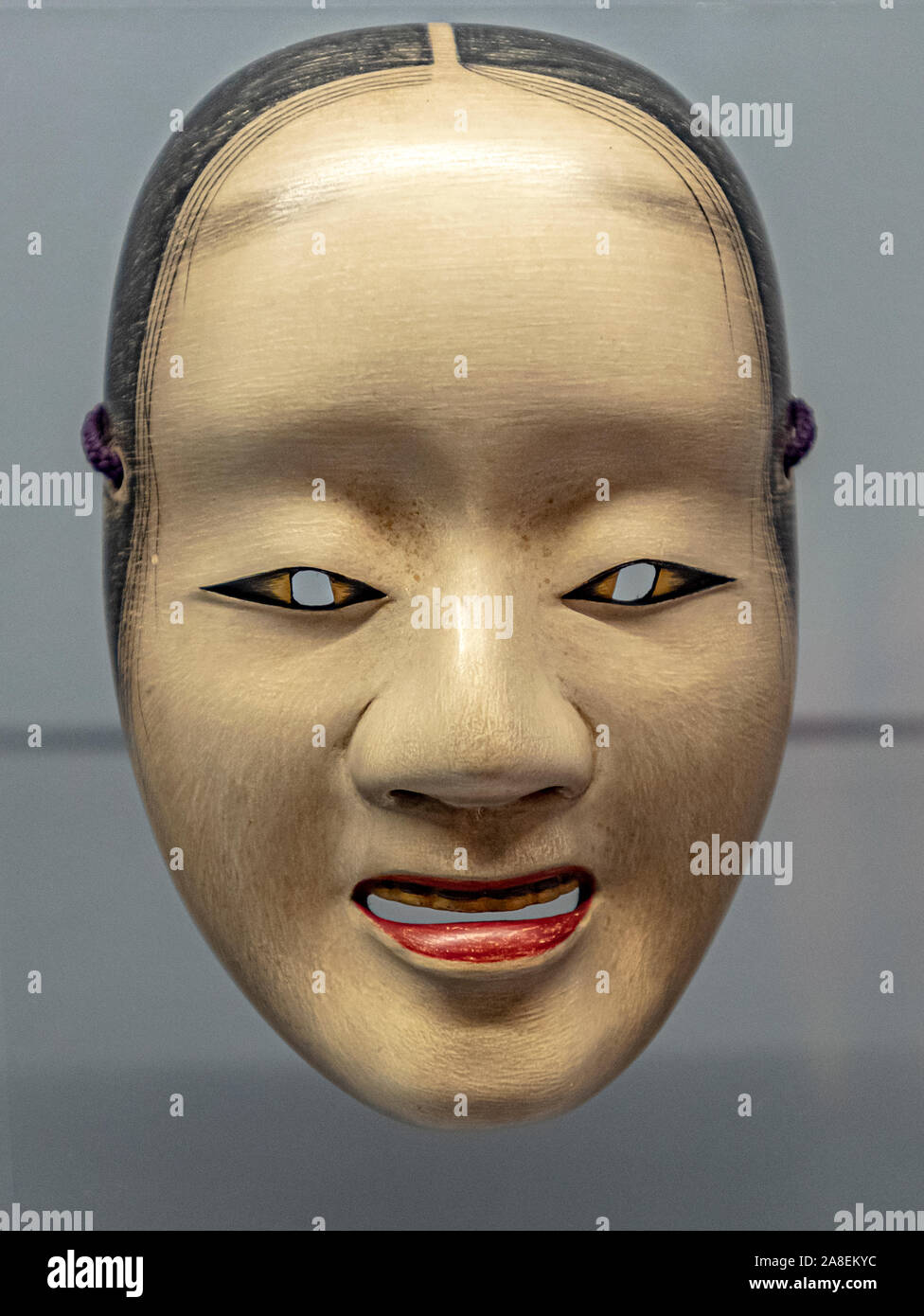Italy Piedmont Turin Mao ( Museo D'arte Orientale ) Museum of Oriental art - Exibhition 'Female warrior from the Rising Sun' - Mask of Woman in the no Theatre - No Theatre Mask -Deigan - Nomura Ran - Painted wood - Showa Period ( 1926 - 1989 )  - Private Collection Stock Photo