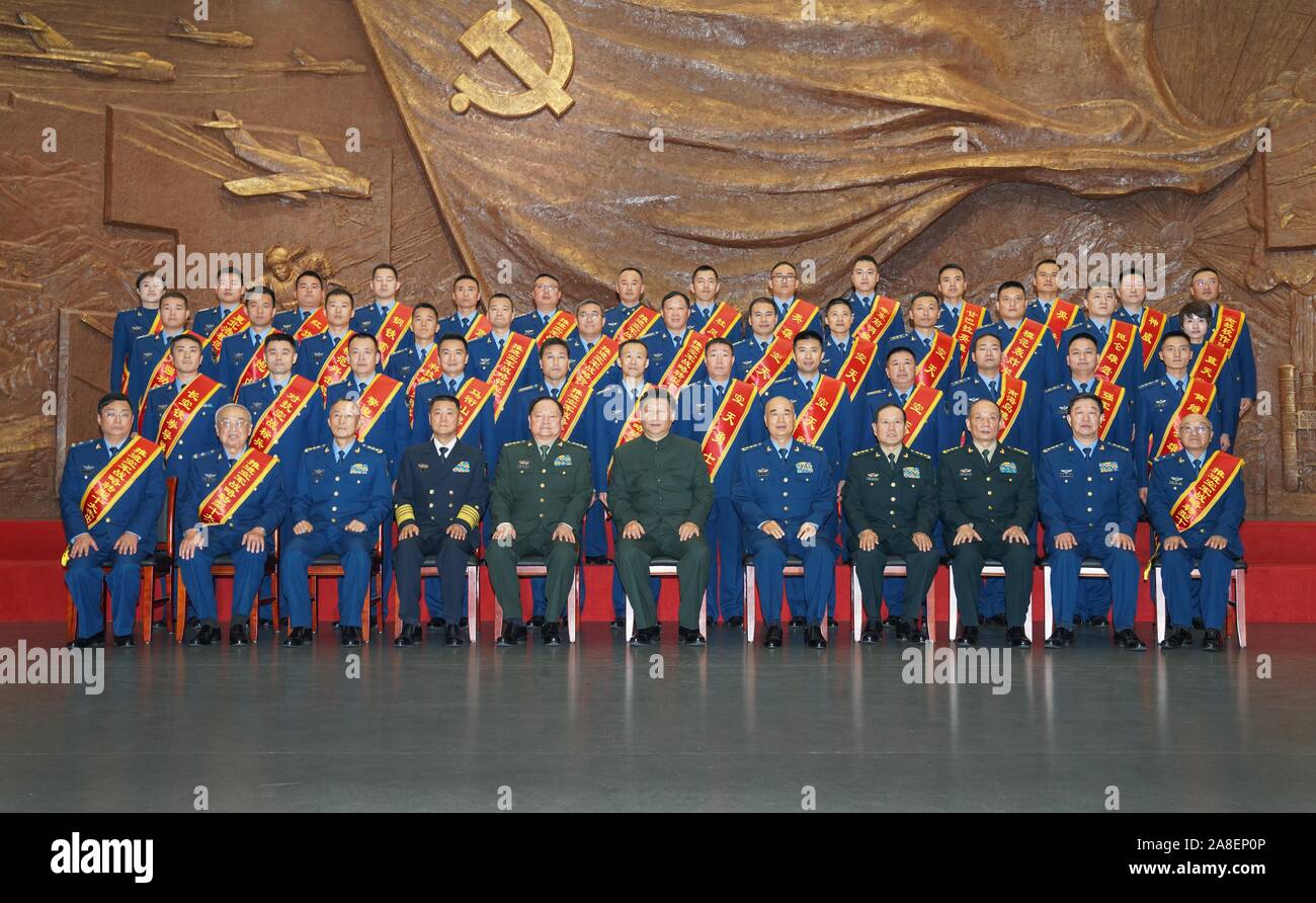 Beijing, China. 08th Nov, 2019. Chinese President Xi Jinping, also general secretary of the Communist Party of China (CPC) Central Committee and chairman of the Central Military Commission (CMC), meets with representatives of model units and individuals of the People's Liberation Army (PLA) Air Force at the China Aviation Museum in Changping District, Beijing, capital of China, Nov. 8, 2019. Xi on Friday attended an event celebrating the 70th founding anniversary of the PLA Air Force in the northern outskirts of Beijing. Credit: Xinhua/Alamy Live News Stock Photo