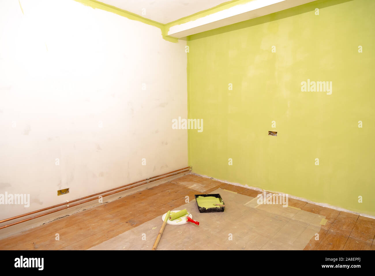 Empty room ready for painting. Painting tools an empty room, ready for