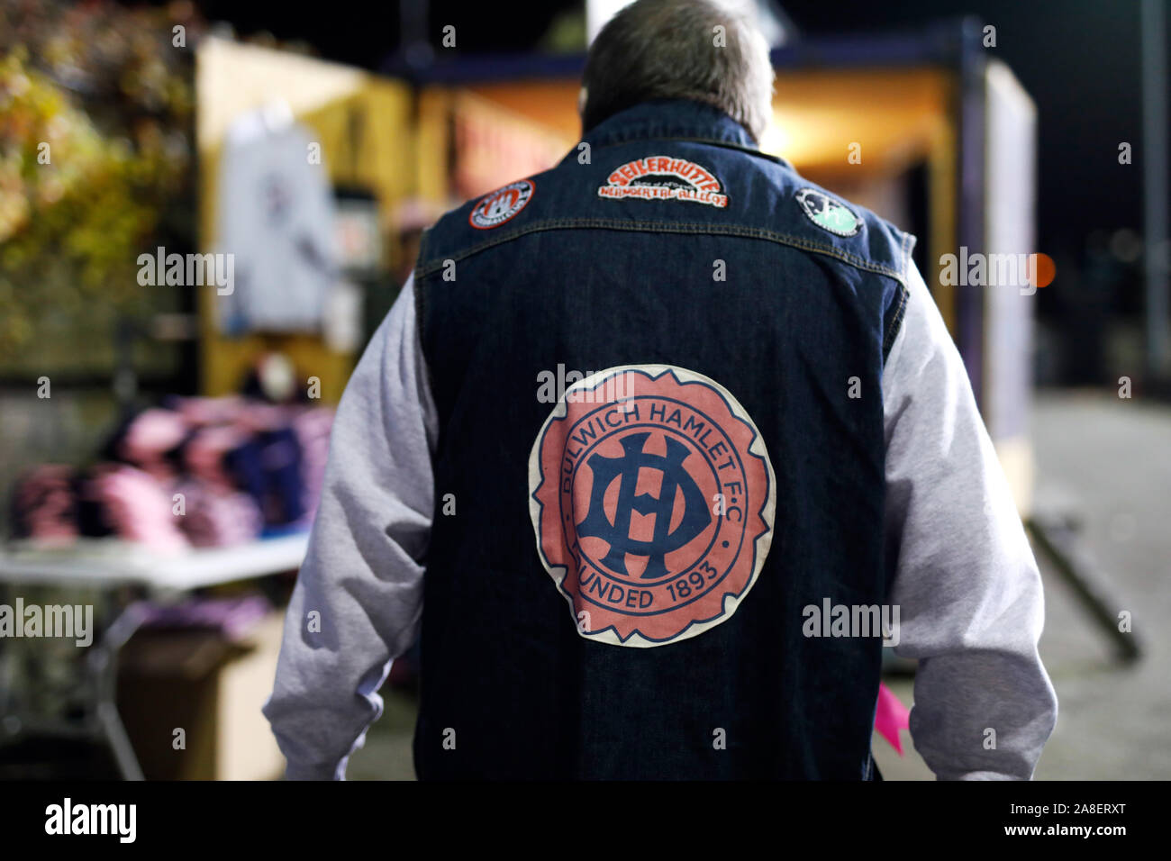 General view of a jacket with a Dulwich Hamlet logo before the FA Cup First Round match at Champion Hill, London. Stock Photo