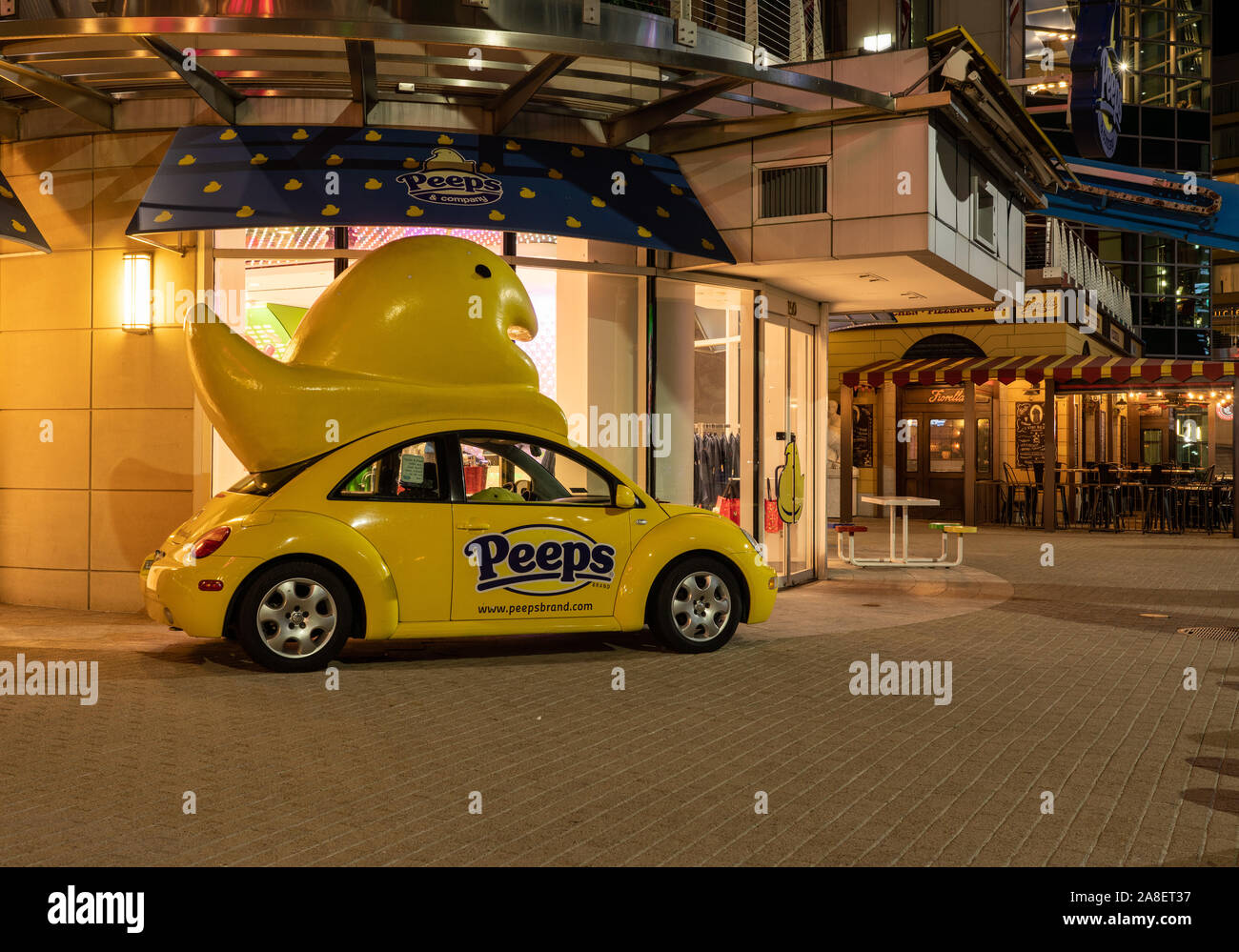National Harbor, MD - 6 November 2019: Yellow Volkswagen Beetle car as brand for Peeps and Company near Washington DC Stock Photo