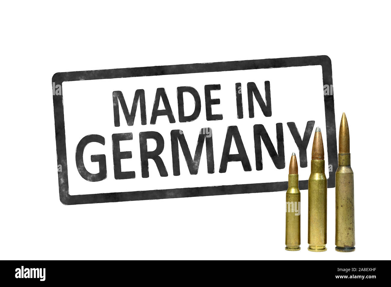 Ein Etikett mit der Aufschrift: 'Made in Germany“, davor Patronen, scharfe Munition, Stock Photo