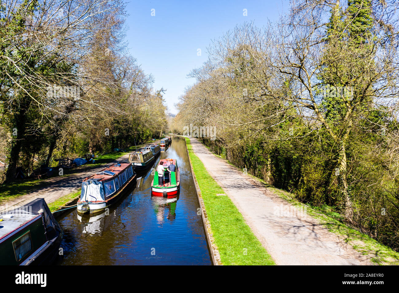 Aerial Overhead View Of Narrow Boats Canal Boats Heading Down To The aerial-overhead-view-of-narrow-boats-canal-boats-heading-down-to-the