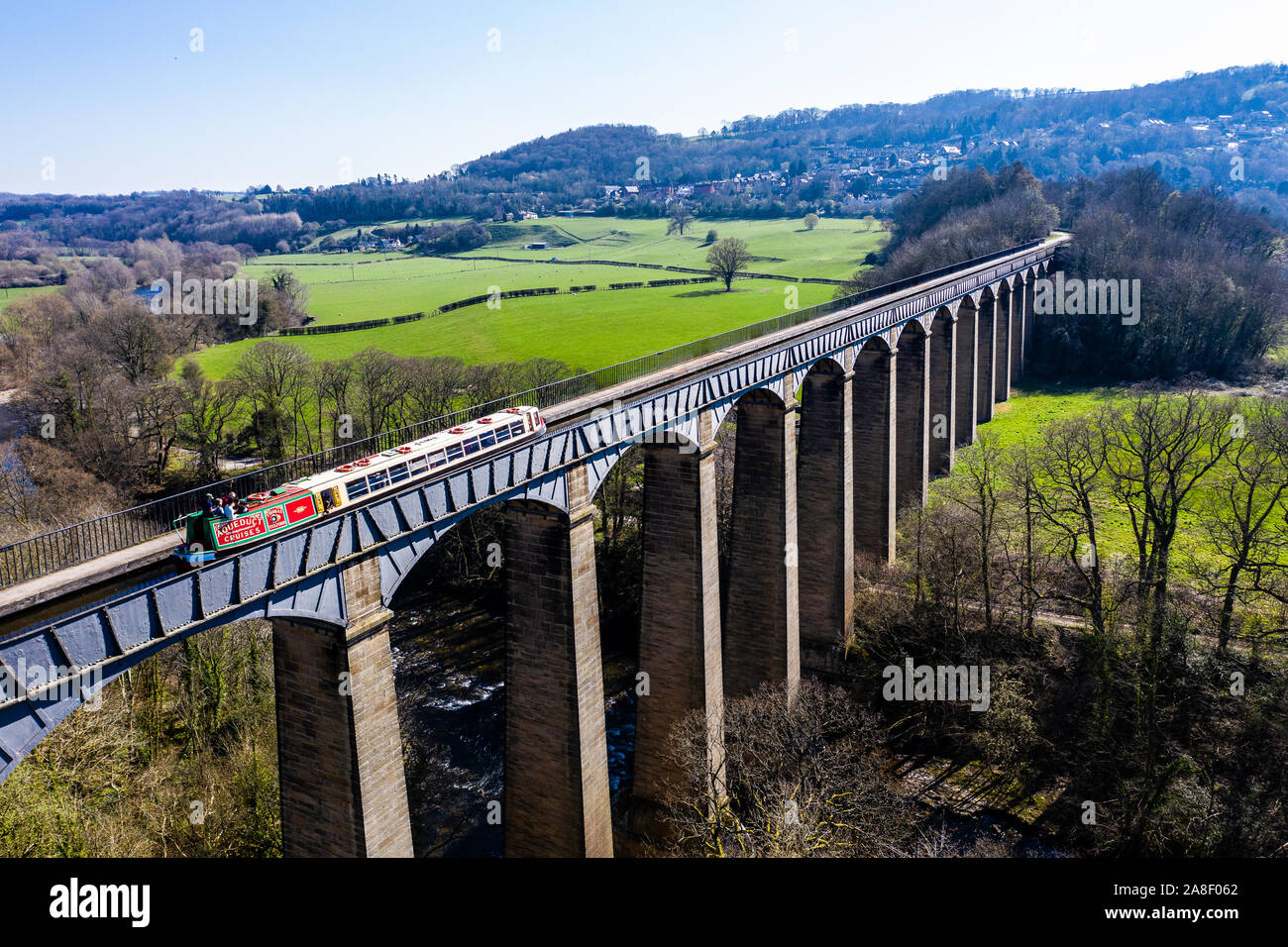 Aerial view of a Narrow Boat, canal boat crossing the Pontcysyllte Aqueduct located in the beautiful Welsh countryside, famous Llangollen Canal route Stock Photo