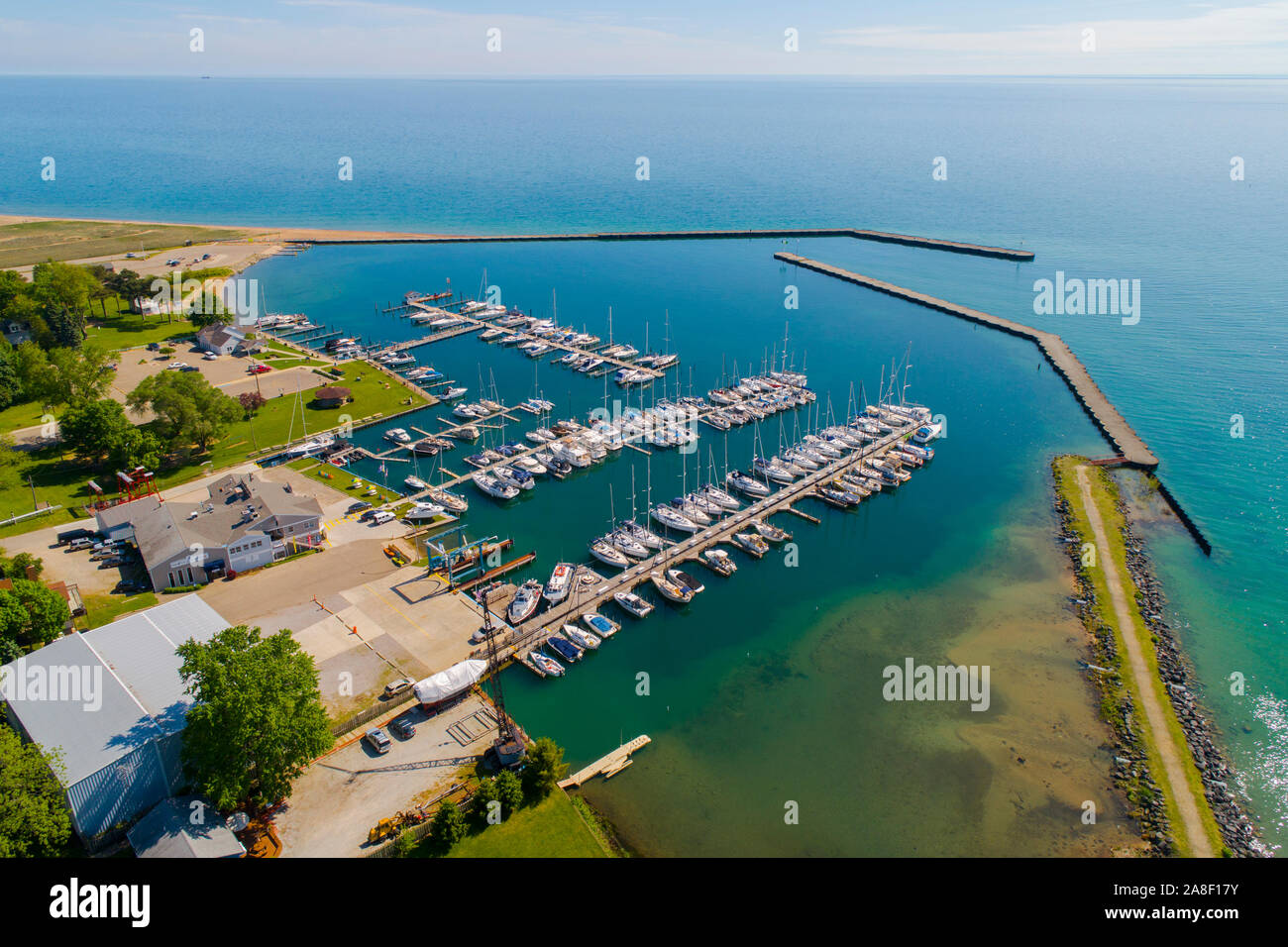 Marina boat docks and jetty with breakwall at Port Sanilac Michigan Stock Photo Alamy