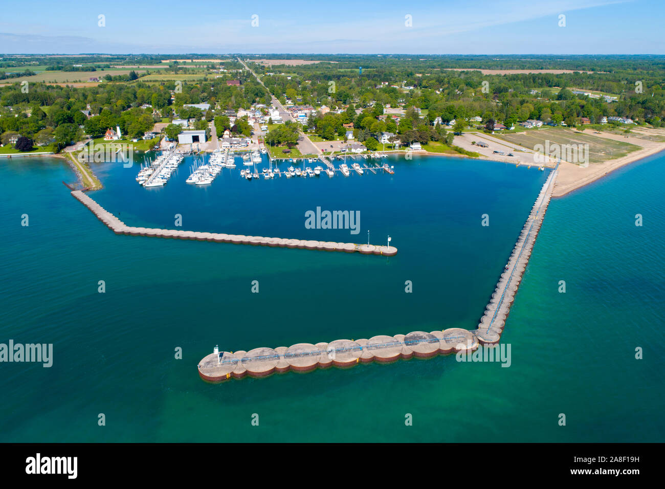 Marina boat docks and jetty with breakwall at Port Sanilac Michigan Stock Photo