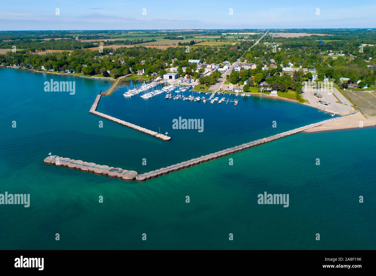 Marina boat docks and jetty with breakwall at Port Sanilac Michigan Stock Photo