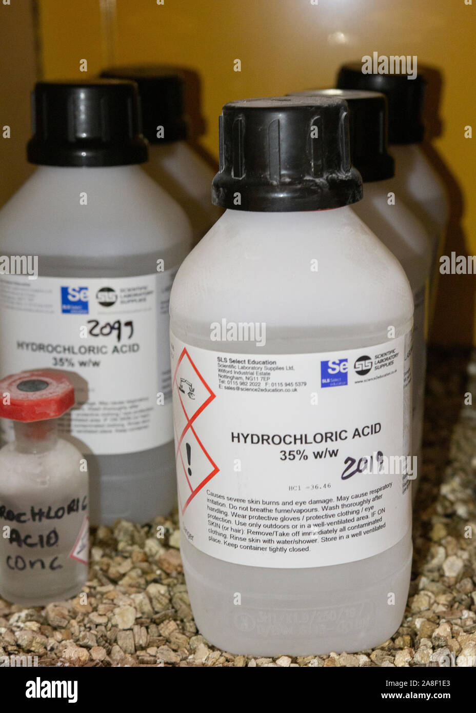 stock bottles of hydrochloric acid in a chemical store in the UK Stock Photo