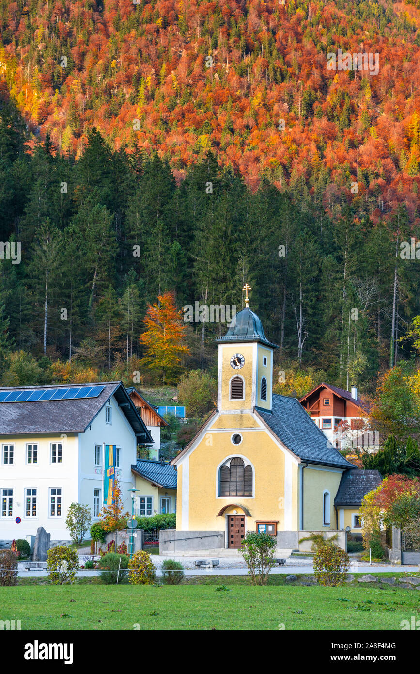 The village Pfarramt Catholic Church with fall foliage color in