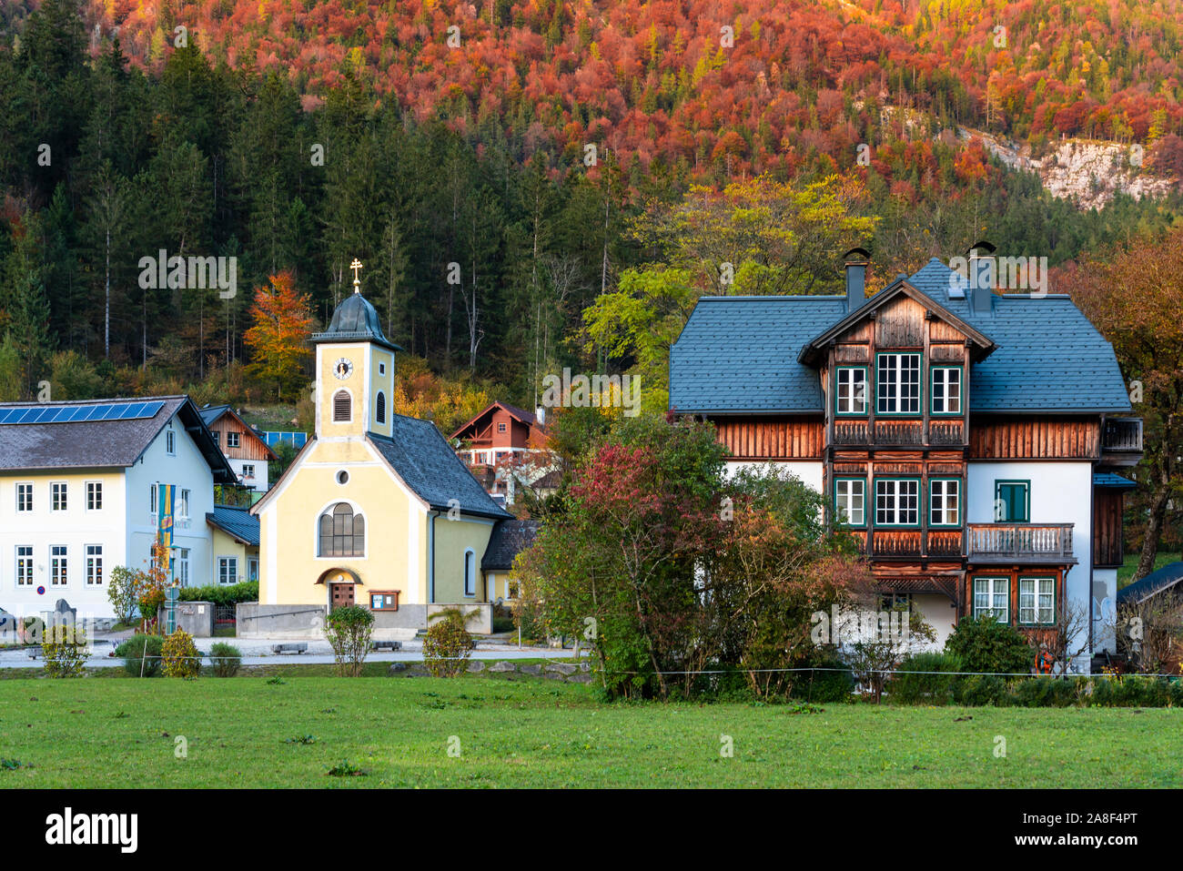 The village Pfarramt Catholic Church with fall foliage color in
