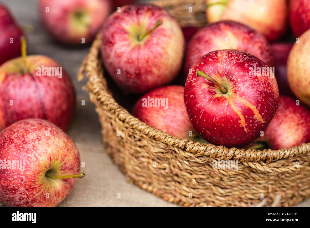 Red apples in a basket Stock Photo