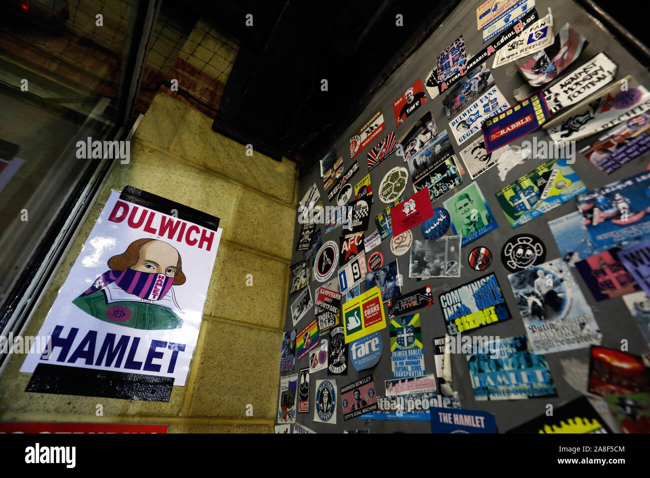 General view of stickers inside the stadium before the FA Cup First Round match at Champion Hill, London. Stock Photo