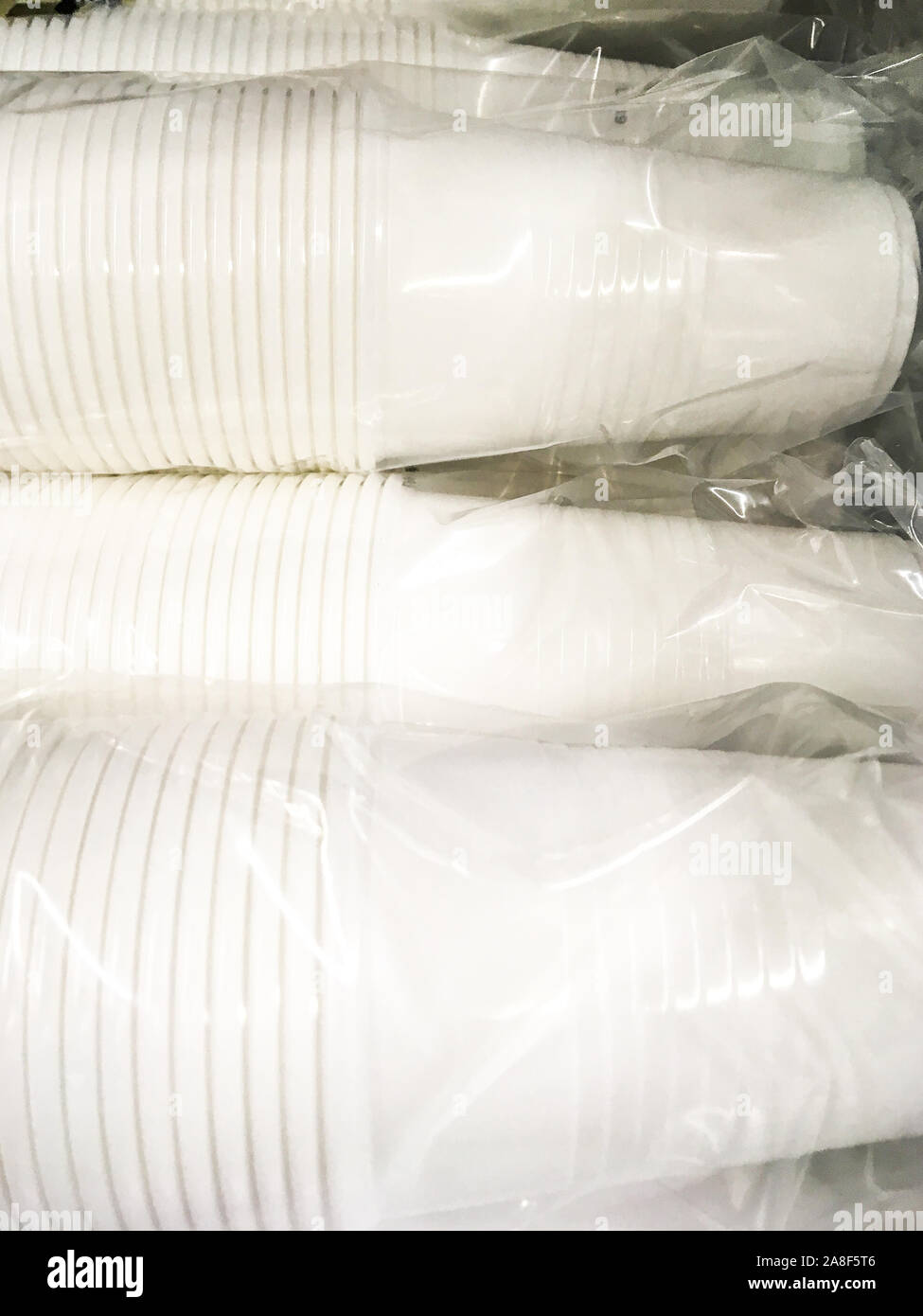 Single use plastic glasses packed under plastic package, Lyon, France ...