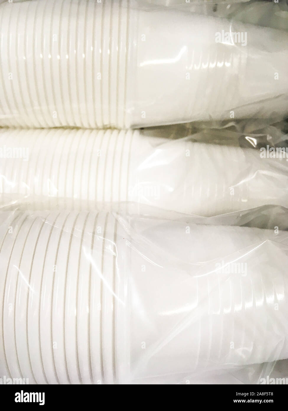 Single use plastic glasses packed under plastic package, Lyon, France ...