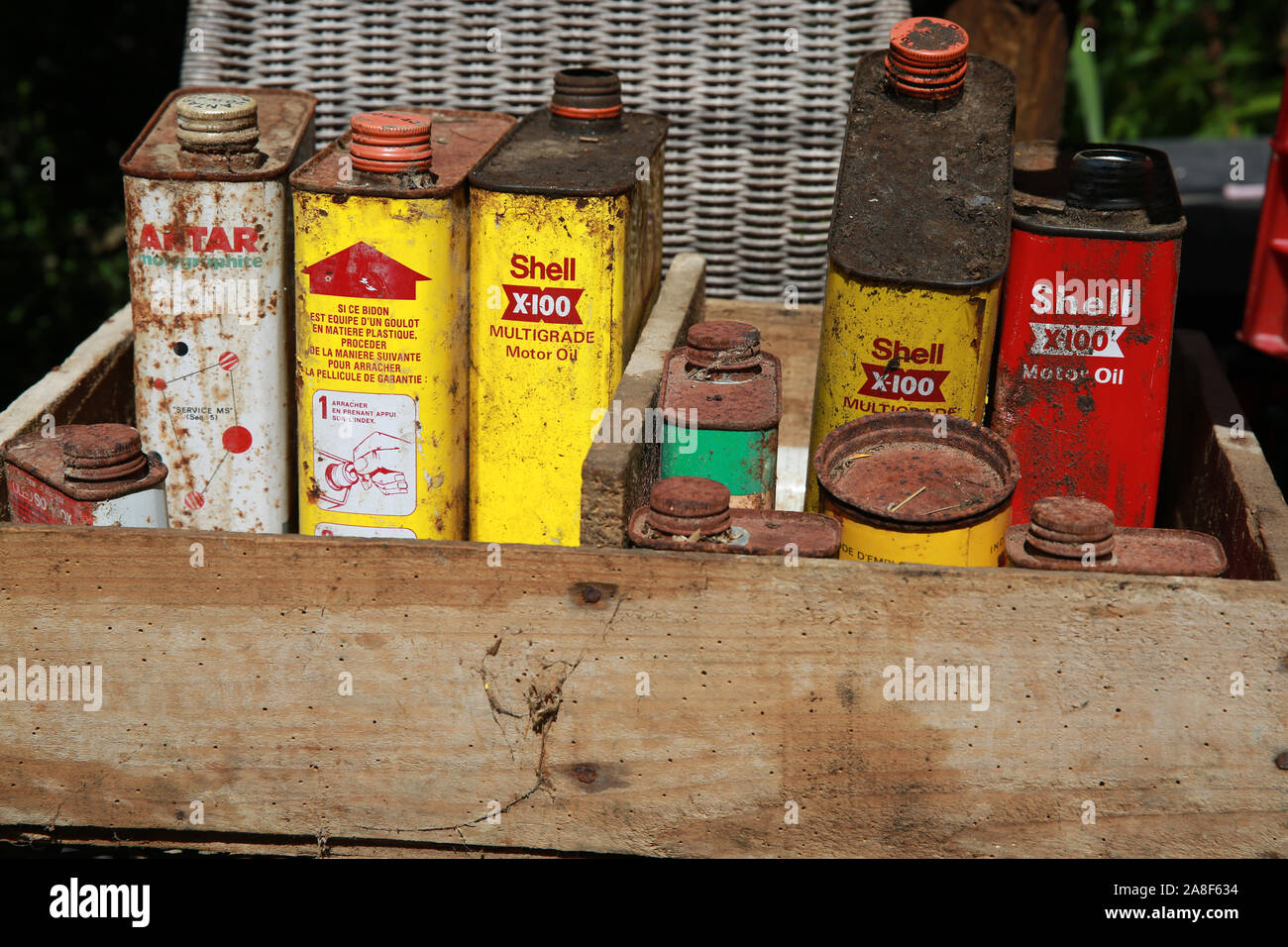 Rusty old petrol cans Stock Photo Alamy
