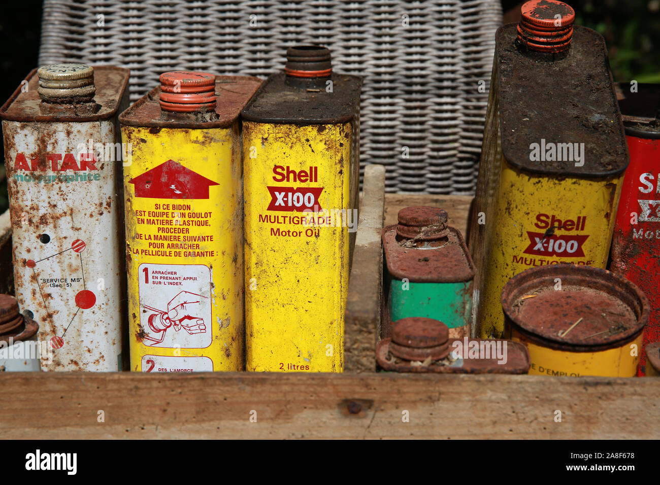 Rusty old petrol cans Stock Photo Alamy