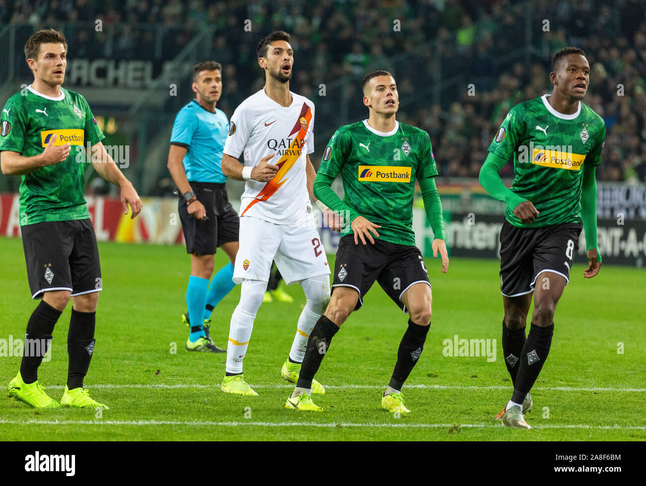 sports, football, UEFA Europe League, 2019/2020, Group Stage, Group J, Matchday 4, Borussia Moenchengladbach vs. AS Rome 2-1, Stadium Borussia Park, scene of the match, f.l.t.r. Jonas Hofmann (MG), referee Jesus Gil Manzano (ESP), Javier Pastore (AS), Laszlo Benes (MG), Denis Zakaria (MG) Stock Photo