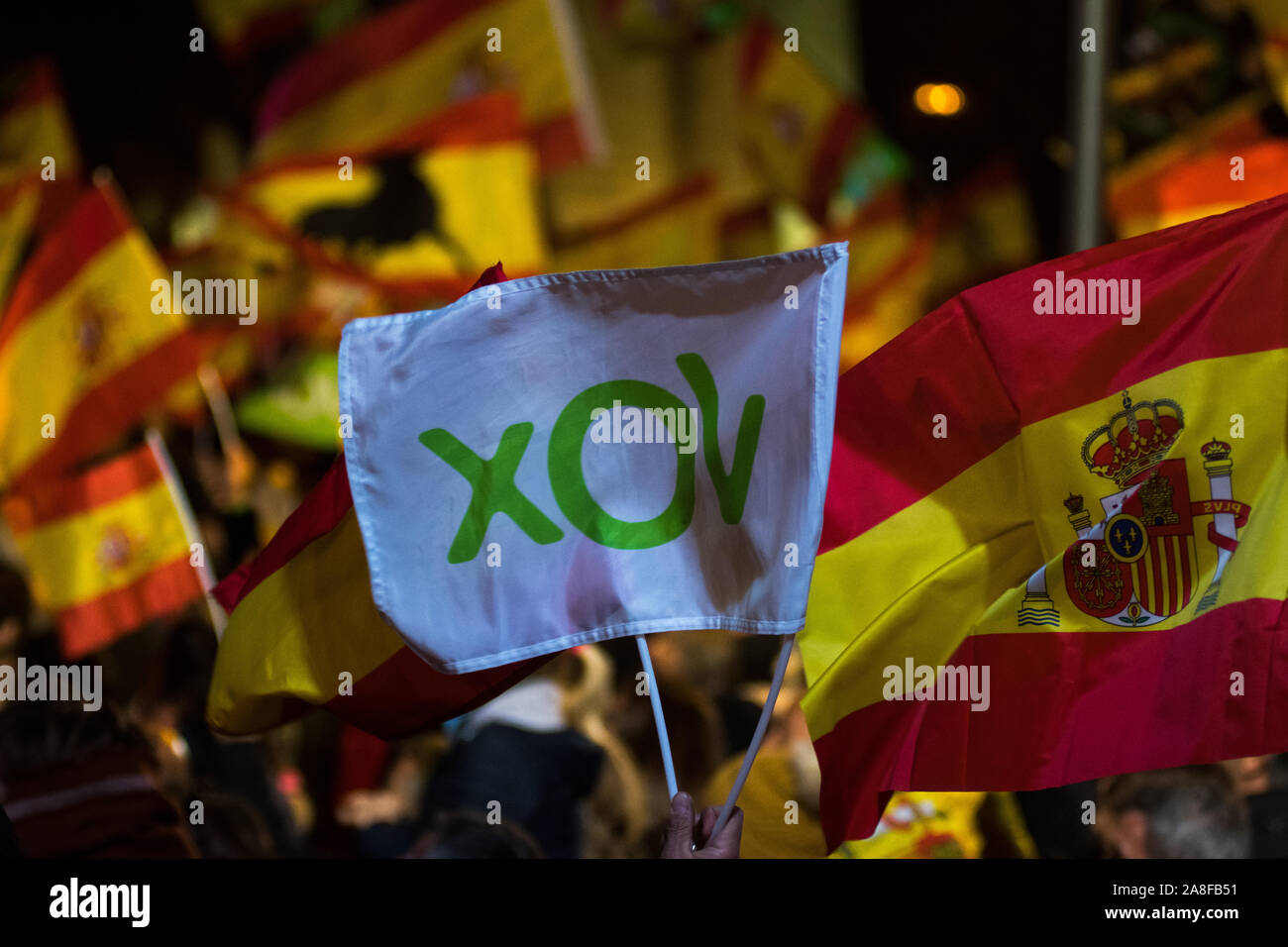 Madrid, Spain, 8th November, 2019. Far right party VOX supporters waving flags during the closure act of the electoral campaign. Spaniards are called to vote in general elections that will take place on November 10. Credit: Marcos del Mazo/Alamy Live News Stock Photo